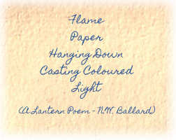 A piece of paper, on which is a short poem
Flame
Paper
Hanging Down
Casting Coloured
Light